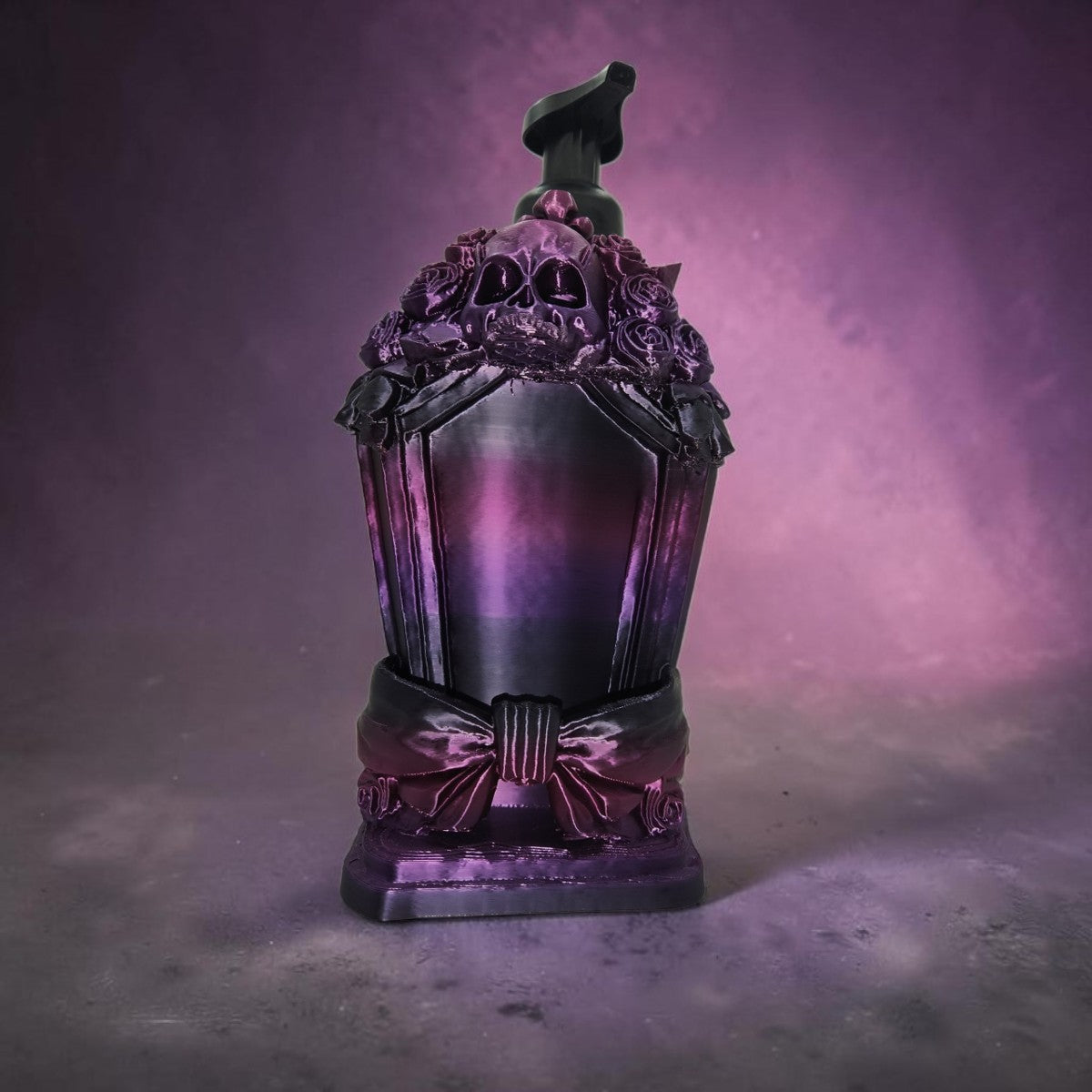 Absolute Prints gothic tombstone soap dispenser with skull and rose details in a purple and black gradient finish.