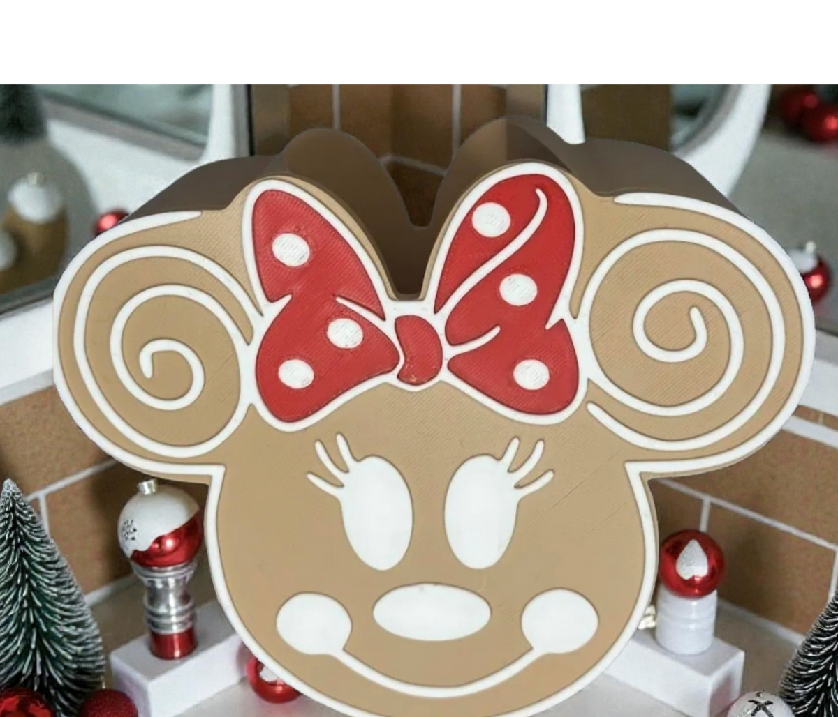 Absolute Prints Minnie Mouse gingerbread tabletop light with a red polka dot bow and white icing details.